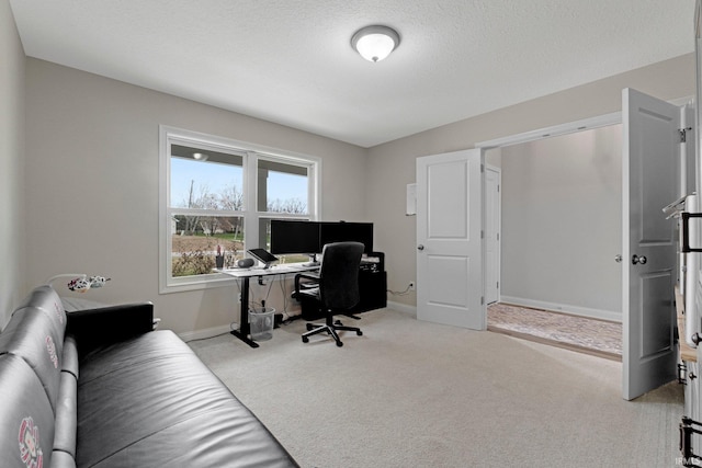 office with carpet flooring and baseboards