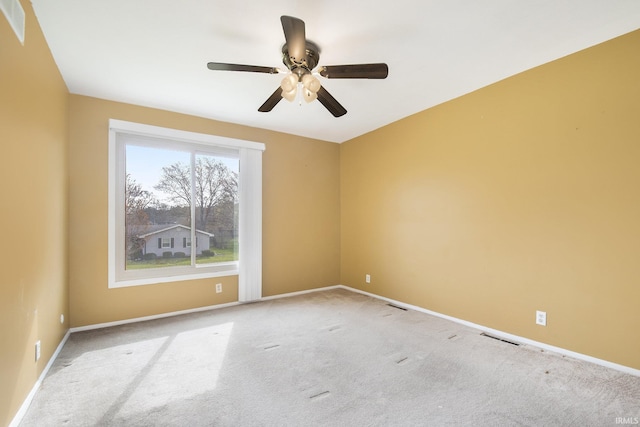 51821 Trowbridge Ln, South Bend, IN 46637 - carpeted empty room featuring visible vents, baseboards, and ceiling fan