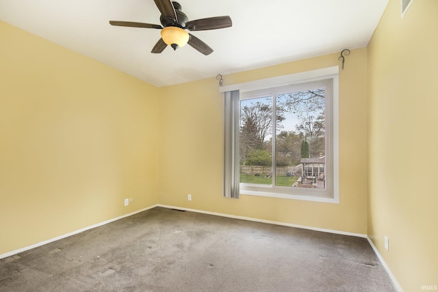 51821 Trowbridge Ln, South Bend, IN 46637 - carpeted empty room with baseboards and a ceiling fan