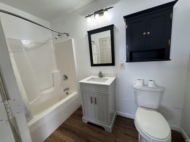 full bathroom featuring vanity, shower / bathing tub combination, toilet, and wood finished floors