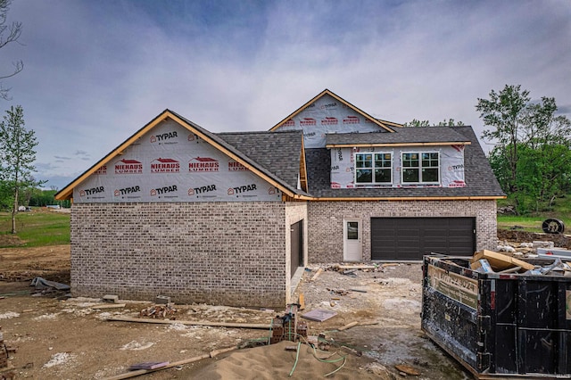 4092 Cottonwood Dr, Victoria Woods, IN 47601 - property under construction featuring a garage, brick siding, and roof with shingles