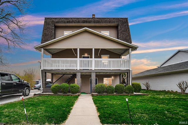 617 Pearl St, Culver, IN 46511 - view of front of home with a front yard and stairway
