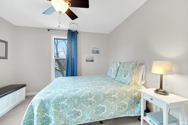 617 Pearl St, Culver, IN 46511 - carpeted bedroom featuring baseboards, a ceiling fan, and visible vents