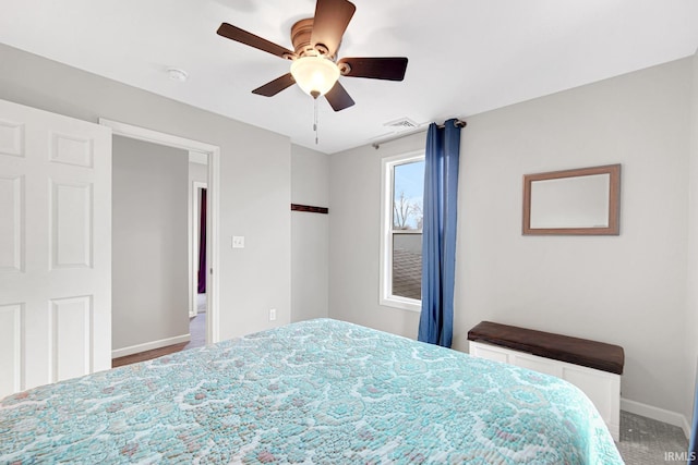 617 Pearl St, Culver, IN 46511 - bedroom featuring visible vents, baseboards, and ceiling fan