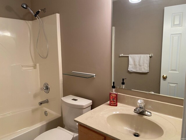 full bath with shower / bath combination, vanity, and toilet