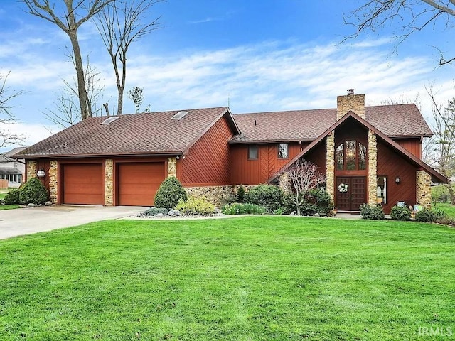 view of front of property with a front yard, stone siding, a chimney, and an attached garage