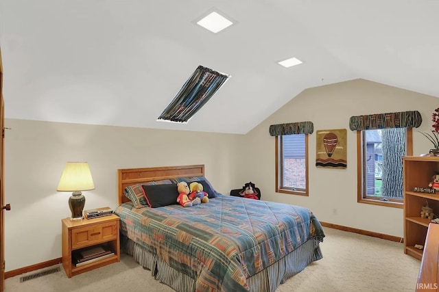 bedroom featuring light carpet, visible vents, baseboards, and vaulted ceiling