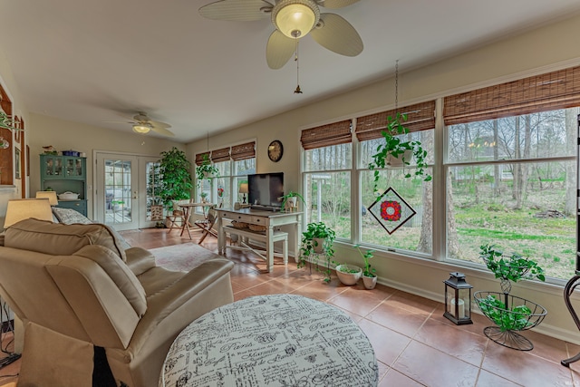 379 Pleasant View Dr, Evansville, IN 47711 - living area with tile patterned flooring, french doors, baseboards, and a ceiling fan