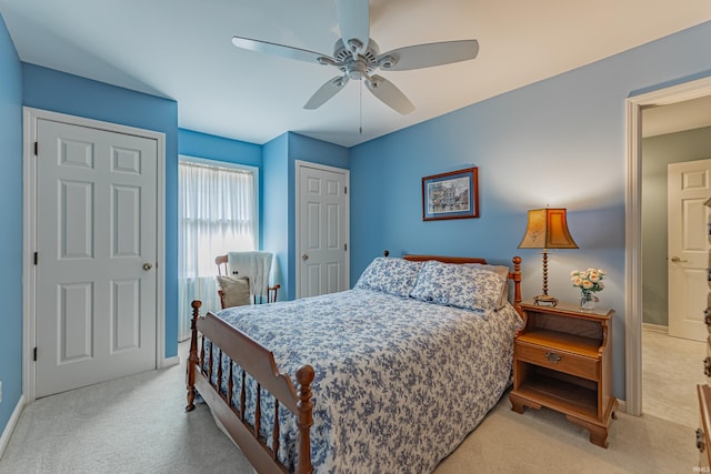379 Pleasant View Dr, Evansville, IN 47711 - bedroom with baseboards, a ceiling fan, and light carpet