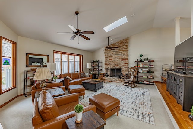379 Pleasant View Dr, Evansville, IN 47711 - living room with plenty of natural light, vaulted ceiling with skylight, and a ceiling fan