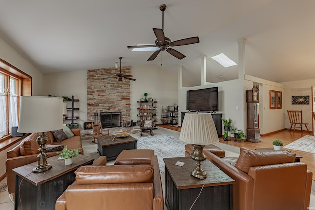 379 Pleasant View Dr, Evansville, IN 47711 - living area with a fireplace, lofted ceiling, light wood-type flooring, and ceiling fan