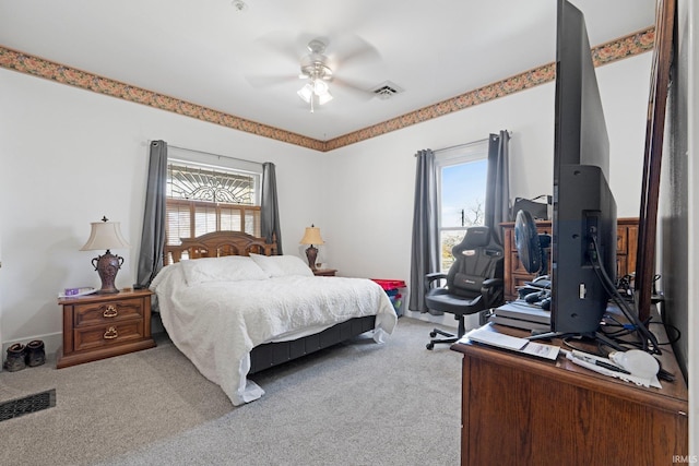 328 W Market St, Bluffton, IN 46714 - bedroom featuring visible vents, light colored carpet, and multiple windows