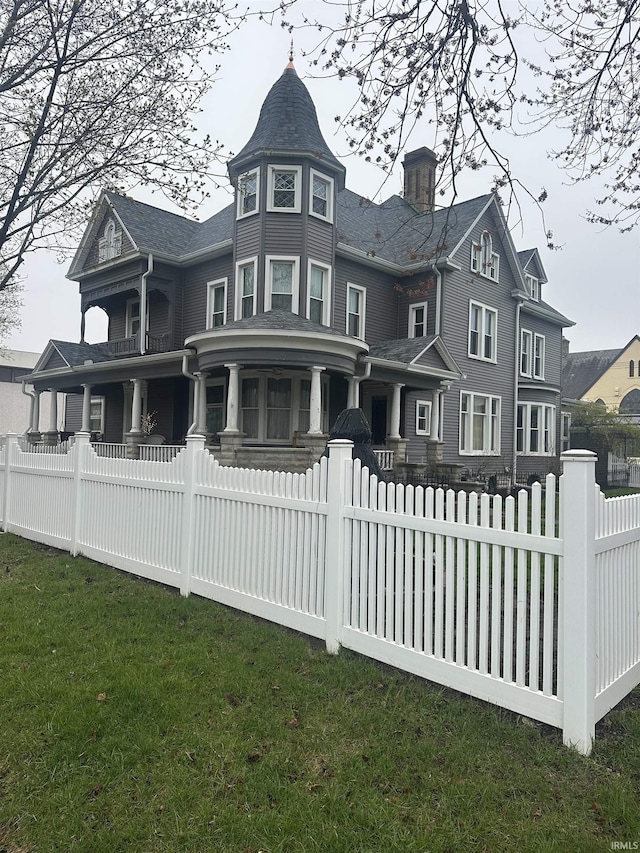 328 W Market St, Bluffton, IN 46714 - exterior space featuring a porch, a chimney, and a fenced front yard