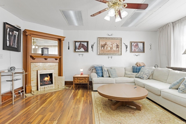 328 W Market St, Bluffton, IN 46714 - living area with a ceiling fan, wood finished floors, and a healthy amount of sunlight