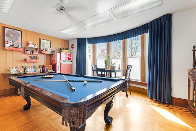 328 W Market St, Bluffton, IN 46714 - recreation room with light wood finished floors, wood walls, pool table, and ceiling fan