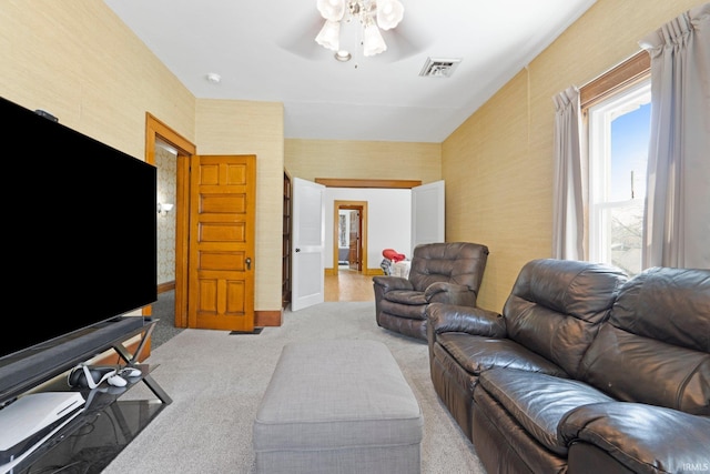 328 W Market St, Bluffton, IN 46714 - living room with light colored carpet, ceiling fan, and visible vents
