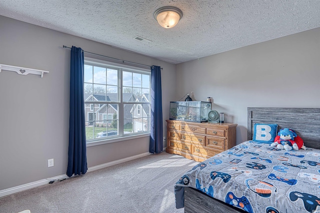 9919 Blyth Dr, Evansville, IN 47725 - bedroom with a textured ceiling, baseboards, and carpet