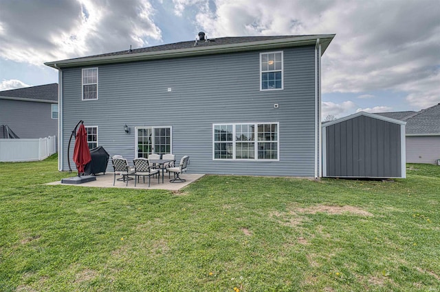 9919 Blyth Dr, Evansville, IN 47725 - rear view of house with a patio, a yard, and fence
