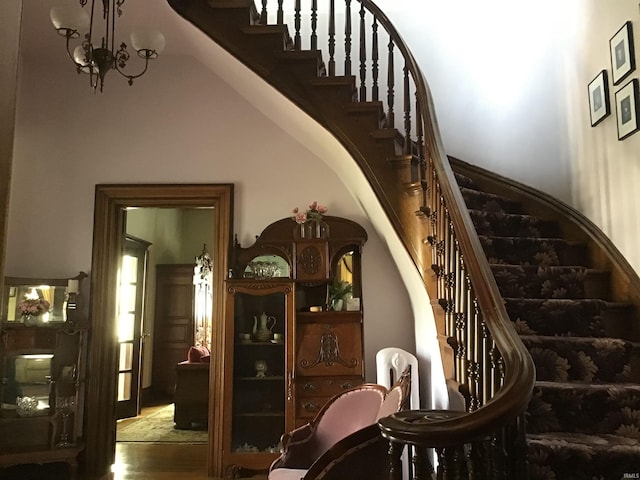 stairway featuring wood finished floors