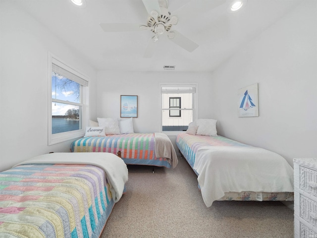 11523 N Crowdale Dr, Syracuse, IN 46567 - carpeted bedroom featuring a ceiling fan, visible vents, and recessed lighting