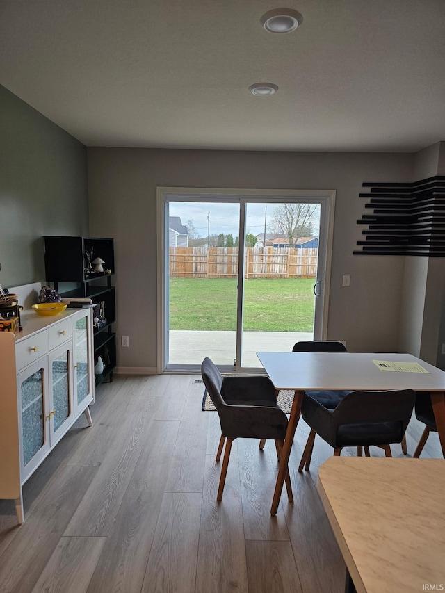 1332 Pueblo Trl, Fort Wayne, IN 46845 - dining area with wood finished floors, baseboards, and recessed lighting