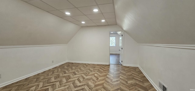 910 Harriet St, Evansville, IN 47710 - bonus room featuring visible vents, baseboards, recessed lighting, and lofted ceiling