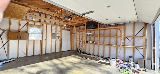 910 Harriet St, Evansville, IN 47710 - garage with electric panel and a garage door opener