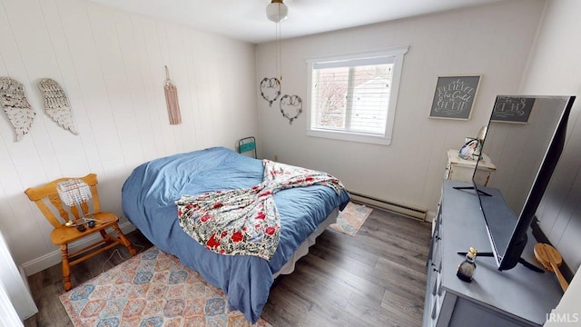 10509 N Lakeview Dr, Monticello, IN 47960 - bedroom featuring wood finished floors and baseboard heating