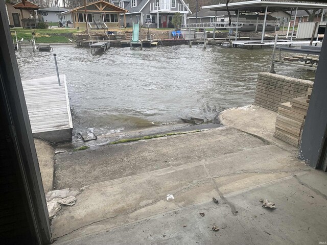 10509 N Lakeview Dr, Monticello, IN 47960 - dock area featuring a residential view and a water view