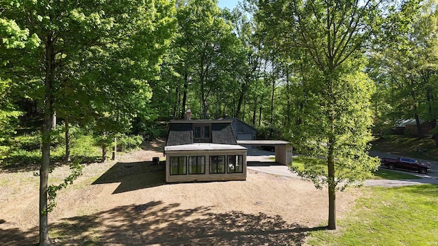 505 Longtree Ln, Logansport, IN 46947 - view of front of property featuring driveway, an outbuilding, and a chimney