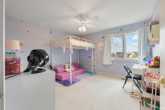 bedroom featuring ceiling fan, baseboards, and carpet floors