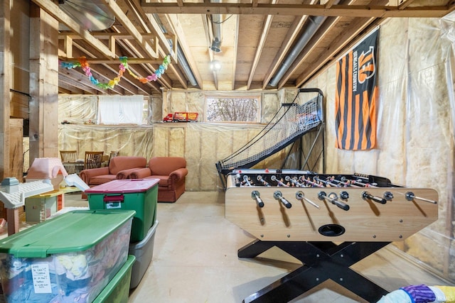 game room with concrete floors