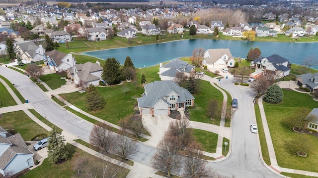 aerial view featuring a water view and a residential view
