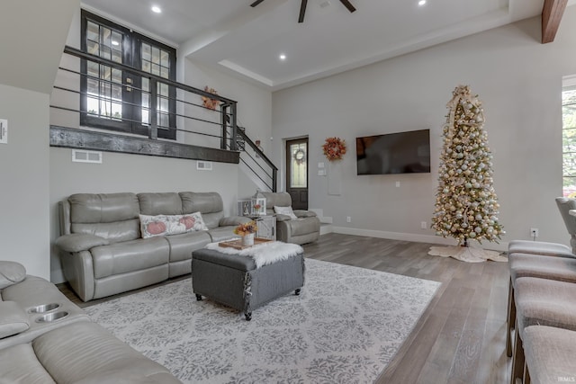 8780 N Old State Road 37th Rd, Bloomington, IN 47408 - living room featuring a ceiling fan, visible vents, recessed lighting, stairway, and wood finished floors