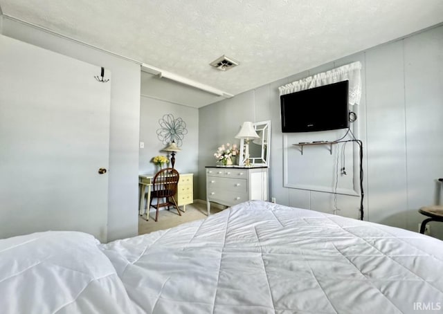 342 E Himes St, North Webster, IN 46555 - bedroom featuring visible vents and a textured ceiling