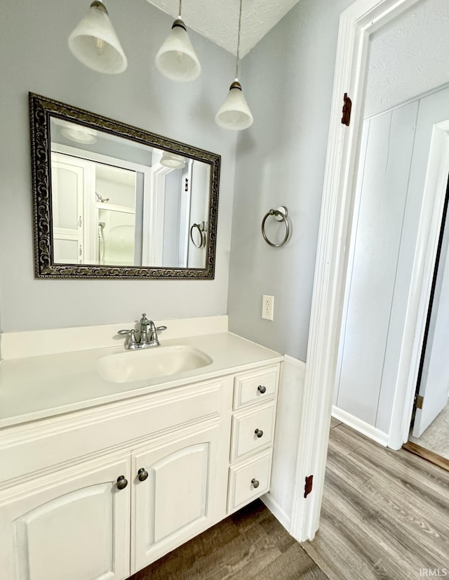 342 E Himes St, North Webster, IN 46555 - bathroom with vanity and wood finished floors
