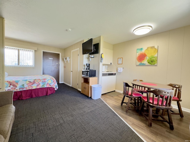 342 E Himes St, North Webster, IN 46555 - bedroom featuring wood finished floors and baseboards