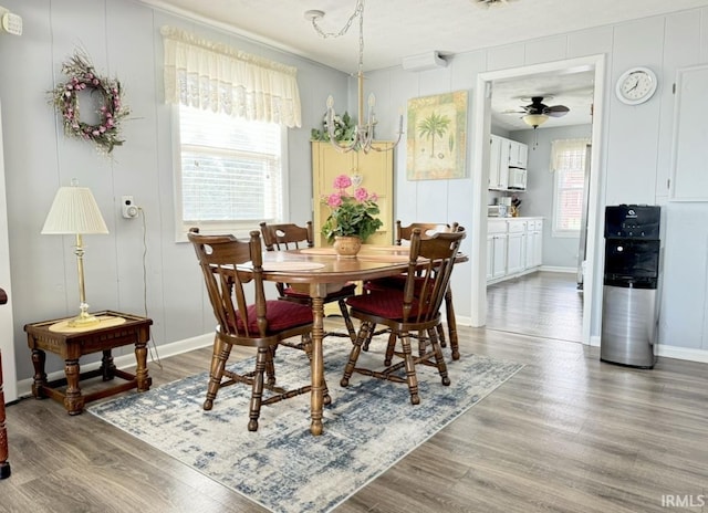 342 E Himes St, North Webster, IN 46555 - dining area with a wealth of natural light, a ceiling fan, wood finished floors, and baseboards
