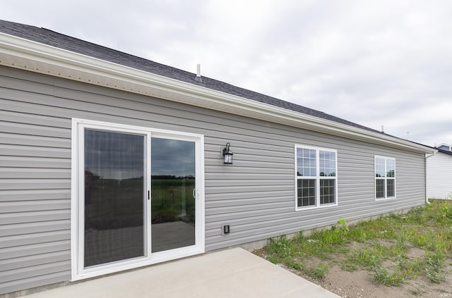 view of home's exterior with a patio