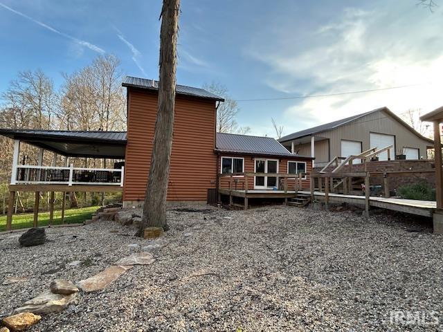 3008 Chigger Ridge Rd Unit 395, 396, Birdseye, IN 47513 - back of house with a wooden deck and metal roof