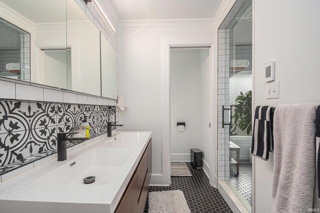 1069 Riverside Dr, South Bend, IN 46616 - full bathroom featuring a stall shower, double vanity, a sink, and ornamental molding