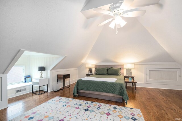 1069 Riverside Dr, South Bend, IN 46616 - bedroom featuring visible vents, baseboards, a ceiling fan, wood finished floors, and lofted ceiling