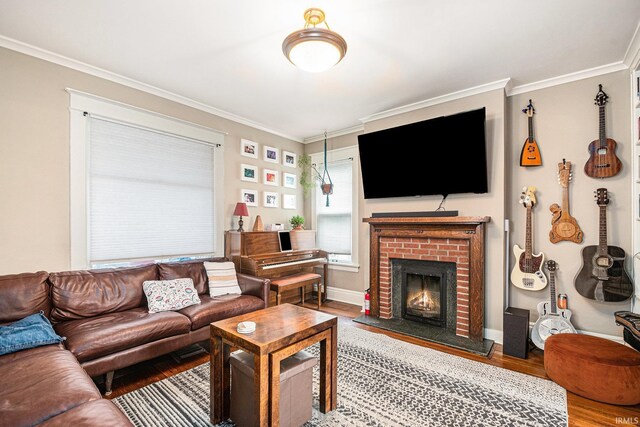 1069 Riverside Dr, South Bend, IN 46616 - living room with a brick fireplace, baseboards, crown molding, and wood finished floors