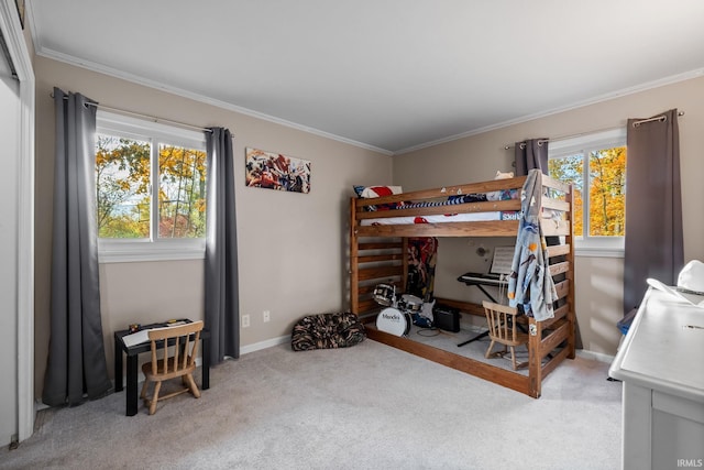 bedroom with crown molding, baseboards, and light colored carpet