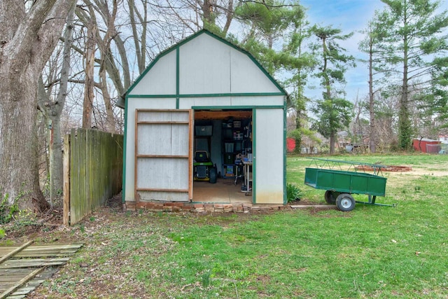 view of shed with fence