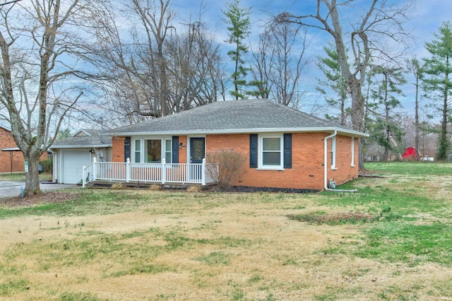 view of front of property featuring concrete driveway, an attached garage, a front yard, brick siding, and a porch
