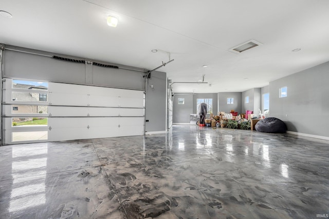 garage featuring baseboards