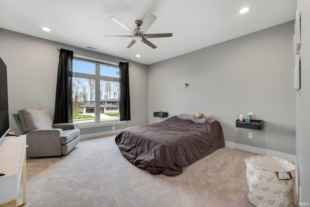 carpeted bedroom with baseboards, a ceiling fan, and recessed lighting