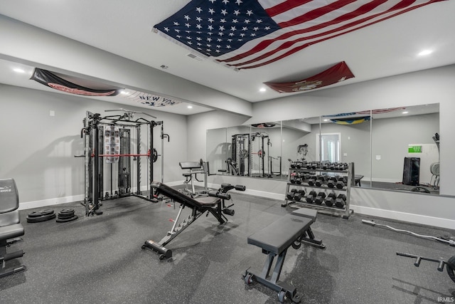 exercise room featuring recessed lighting, visible vents, and baseboards