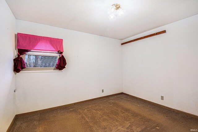 619 Widaman St, Warsaw, IN 46580 - unfurnished room featuring carpet flooring and baseboards